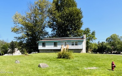 Opportunity knocks with this perfect fixer upper full of on The Hideout Golf in Pennsylvania - for sale on GolfHomes.com, golf home, golf lot