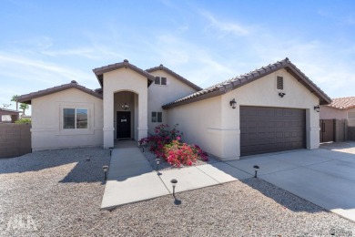This charming ranch-style 3 bedroom home in the rapidly growing on The Links At Coyote Wash in Arizona - for sale on GolfHomes.com, golf home, golf lot