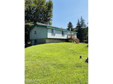 Opportunity knocks with this perfect fixer upper full of on The Hideout Golf in Pennsylvania - for sale on GolfHomes.com, golf home, golf lot
