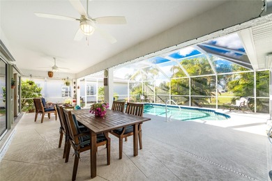 Under contract-accepting backup offers. A Poolside Retreat with on Pinemoor West Golf Club in Florida - for sale on GolfHomes.com, golf home, golf lot