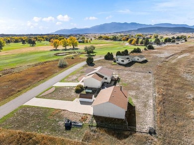 Fabulous location, location, location across from Hollydot Golf on Hollydot Golf Course in Colorado - for sale on GolfHomes.com, golf home, golf lot