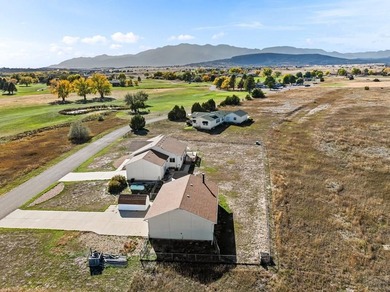 Fabulous location, location, location across from Hollydot Golf on Hollydot Golf Course in Colorado - for sale on GolfHomes.com, golf home, golf lot