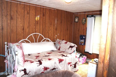 Opportunity knocks with this perfect fixer upper full of on The Hideout Golf in Pennsylvania - for sale on GolfHomes.com, golf home, golf lot