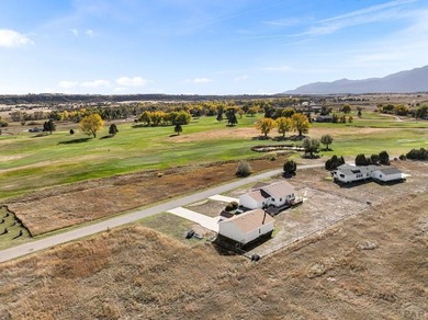 Fabulous location, location, location across from Hollydot Golf on Hollydot Golf Course in Colorado - for sale on GolfHomes.com, golf home, golf lot
