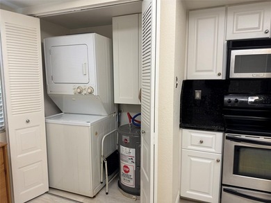 Welcome to this beautifully updated 2-bedroom, 2-bath condo in a on  in Florida - for sale on GolfHomes.com, golf home, golf lot