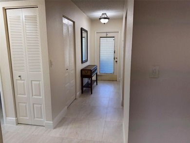 Welcome to this beautifully updated 2-bedroom, 2-bath condo in a on  in Florida - for sale on GolfHomes.com, golf home, golf lot
