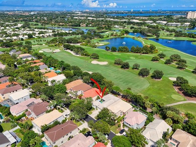 Rarely available single-story courtyard home perfectly situated on The President Country Club in Florida - for sale on GolfHomes.com, golf home, golf lot