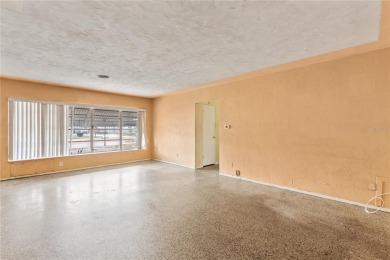 Offered for sale is this incredible 2-bedroom, 2-bathroom, 1 car on Pasadena Yacht and Country Club in Florida - for sale on GolfHomes.com, golf home, golf lot