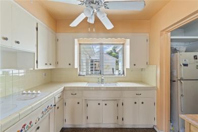 Offered for sale is this incredible 2-bedroom, 2-bathroom, 1 car on Pasadena Yacht and Country Club in Florida - for sale on GolfHomes.com, golf home, golf lot