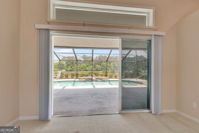 This bright, sunlit gem is situated overlooking a beautiful lake on Braelinn Golf Club in Georgia - for sale on GolfHomes.com, golf home, golf lot