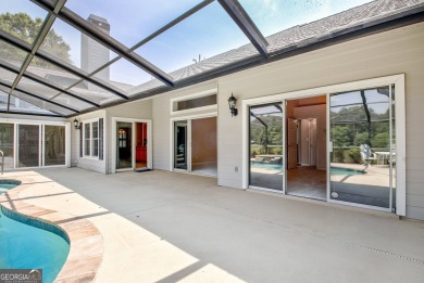 This bright, sunlit gem is situated overlooking a beautiful lake on Braelinn Golf Club in Georgia - for sale on GolfHomes.com, golf home, golf lot