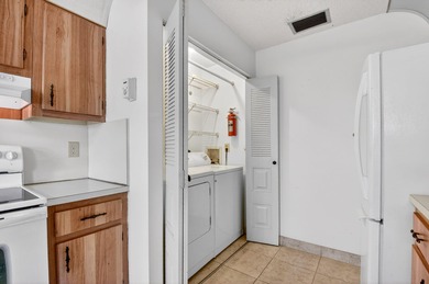 Experience stress-free, easy living in the gated Cypress Lakes on Cypress Lakes Golf Course - West Palm Beach in Florida - for sale on GolfHomes.com, golf home, golf lot