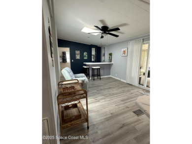 This property boasts numerous desirable features. New Roof 2023 on Barefoot Bay Golf Course in Florida - for sale on GolfHomes.com, golf home, golf lot