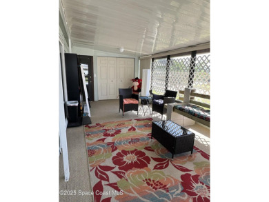This property boasts numerous desirable features. New Roof 2023 on Barefoot Bay Golf Course in Florida - for sale on GolfHomes.com, golf home, golf lot