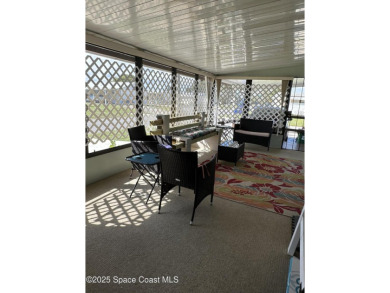 This property boasts numerous desirable features. New Roof 2023 on Barefoot Bay Golf Course in Florida - for sale on GolfHomes.com, golf home, golf lot