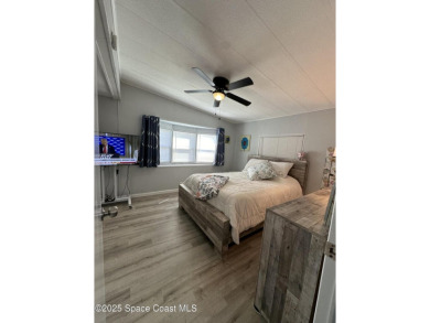 This property boasts numerous desirable features. New Roof 2023 on Barefoot Bay Golf Course in Florida - for sale on GolfHomes.com, golf home, golf lot
