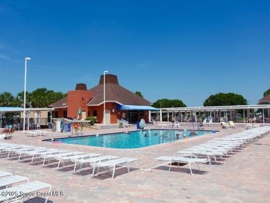 This property boasts numerous desirable features. New Roof 2023 on Barefoot Bay Golf Course in Florida - for sale on GolfHomes.com, golf home, golf lot