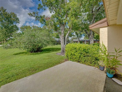 Welcome home to this stunning property located in Villas on the on Highland Lakes Executive Golf Course in Florida - for sale on GolfHomes.com, golf home, golf lot