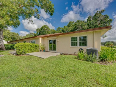 Welcome home to this stunning property located in Villas on the on Highland Lakes Executive Golf Course in Florida - for sale on GolfHomes.com, golf home, golf lot