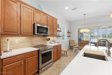 The Florencia II, built by WCI, is located in the highly on Pelican Preserve Golf Club in Florida - for sale on GolfHomes.com, golf home, golf lot