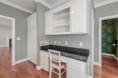 Located in highly sought after Woodside, this exceptional golf on Woodside Plantation Country Club in South Carolina - for sale on GolfHomes.com, golf home, golf lot