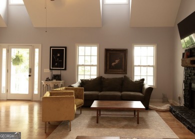 Step into this beautifully maintained home that welcomes you on Fairfield Plantation Golf and Country Club in Georgia - for sale on GolfHomes.com, golf home, golf lot
