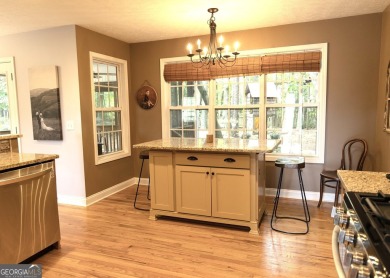 Step into this beautifully maintained home that welcomes you on Fairfield Plantation Golf and Country Club in Georgia - for sale on GolfHomes.com, golf home, golf lot
