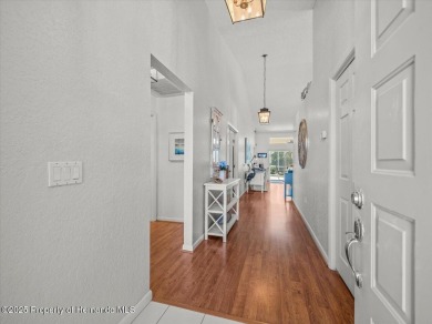 Beautifully updated 1990 Palmwood Bermuda  pool home. This on Glen Lakes Country Club in Florida - for sale on GolfHomes.com, golf home, golf lot