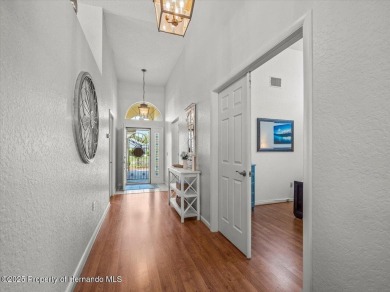 Beautifully updated 1990 Palmwood Bermuda  pool home. This on Glen Lakes Country Club in Florida - for sale on GolfHomes.com, golf home, golf lot