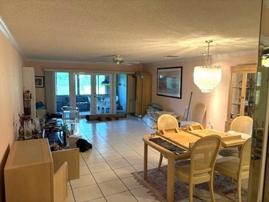 On Golf Course Views of CC of Miami!! One story corner unit with on Country Club of Miami in Florida - for sale on GolfHomes.com, golf home, golf lot