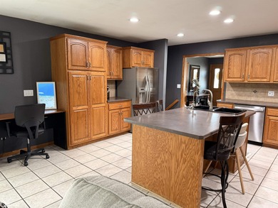 Welcome to this tastefully done 4 bedroom, 2 bath home situated on Carroll Municipal Golf Course in Iowa - for sale on GolfHomes.com, golf home, golf lot