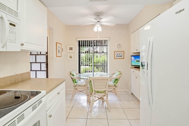 Enjoy serene views from this charming 1st floor 2BR/2BA + Den on Boca Delray Golf and Country Club in Florida - for sale on GolfHomes.com, golf home, golf lot