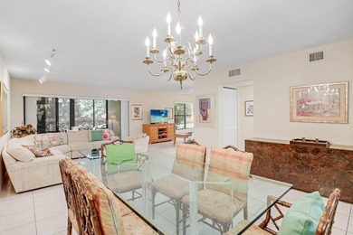 Enjoy serene views from this charming 1st floor 2BR/2BA + Den on Boca Delray Golf and Country Club in Florida - for sale on GolfHomes.com, golf home, golf lot