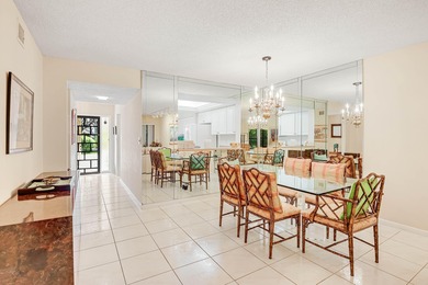 Enjoy serene views from this charming 1st floor 2BR/2BA + Den on Boca Delray Golf and Country Club in Florida - for sale on GolfHomes.com, golf home, golf lot