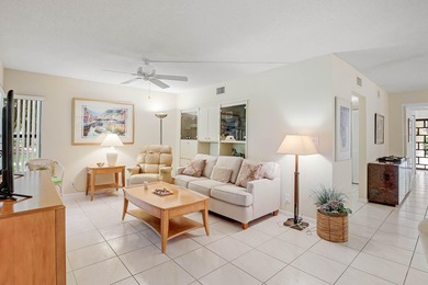 Enjoy serene views from this charming 1st floor 2BR/2BA + Den on Boca Delray Golf and Country Club in Florida - for sale on GolfHomes.com, golf home, golf lot