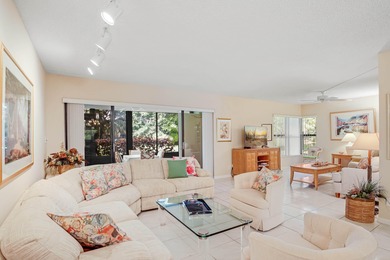 Enjoy serene views from this charming 1st floor 2BR/2BA + Den on Boca Delray Golf and Country Club in Florida - for sale on GolfHomes.com, golf home, golf lot