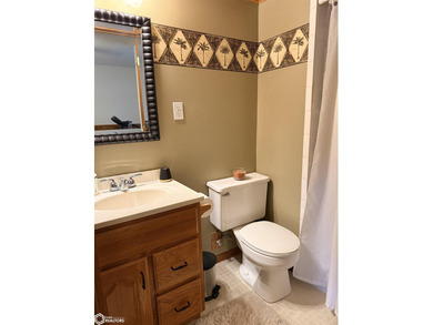 Welcome to this tastefully done 4 bedroom, 2 bath home situated on Carroll Municipal Golf Course in Iowa - for sale on GolfHomes.com, golf home, golf lot