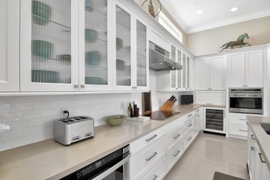 Discover timeless elegance in this 5-bedroom, 5.1/2 -bath on Palm Beach Polo and Country Club in Florida - for sale on GolfHomes.com, golf home, golf lot