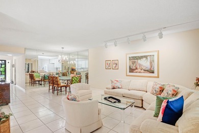 Enjoy serene views from this charming 1st floor 2BR/2BA + Den on Boca Delray Golf and Country Club in Florida - for sale on GolfHomes.com, golf home, golf lot