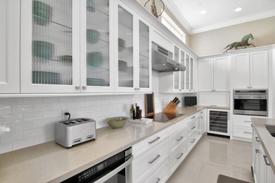 Discover timeless elegance in this 5-bedroom, 5.1/2 -bath on Palm Beach Polo and Country Club in Florida - for sale on GolfHomes.com, golf home, golf lot