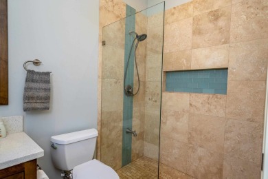 This spectacular custom home in arguably Kihei's finest on Wailea Golf Club in Hawaii - for sale on GolfHomes.com, golf home, golf lot