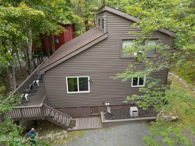 Welcome to this contemporary Pocono retreat located in the on The Hideout Golf in Pennsylvania - for sale on GolfHomes.com, golf home, golf lot
