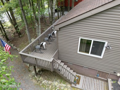 Welcome to this contemporary Pocono retreat located in the on The Hideout Golf in Pennsylvania - for sale on GolfHomes.com, golf home, golf lot