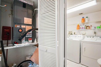 Enjoy serene views from this charming 1st floor 2BR/2BA + Den on Boca Delray Golf and Country Club in Florida - for sale on GolfHomes.com, golf home, golf lot