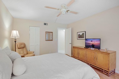 Enjoy serene views from this charming 1st floor 2BR/2BA + Den on Boca Delray Golf and Country Club in Florida - for sale on GolfHomes.com, golf home, golf lot