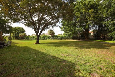 Enjoy serene views from this charming 1st floor 2BR/2BA + Den on Boca Delray Golf and Country Club in Florida - for sale on GolfHomes.com, golf home, golf lot