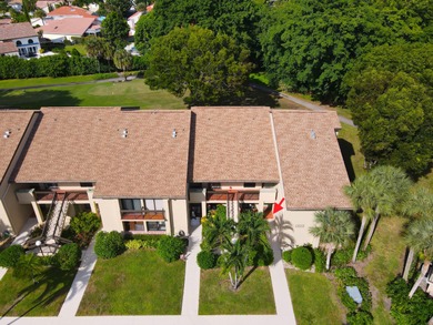 Enjoy serene views from this charming 1st floor 2BR/2BA + Den on Boca Delray Golf and Country Club in Florida - for sale on GolfHomes.com, golf home, golf lot