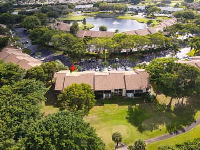 Enjoy serene views from this charming 1st floor 2BR/2BA + Den on Boca Delray Golf and Country Club in Florida - for sale on GolfHomes.com, golf home, golf lot