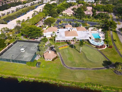 Enjoy serene views from this charming 1st floor 2BR/2BA + Den on Boca Delray Golf and Country Club in Florida - for sale on GolfHomes.com, golf home, golf lot