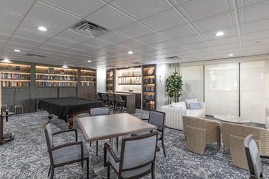 Enjoy serene views from this charming 1st floor 2BR/2BA + Den on Boca Delray Golf and Country Club in Florida - for sale on GolfHomes.com, golf home, golf lot